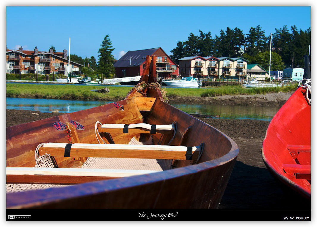 Native canoe on the shore.